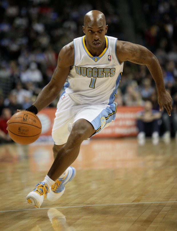 Denver Nuggets guard Chauncey Billups (1) drives towards the basket against the Philadelphia 76ers in the first quarter of an NBA basketball game in Denver, Dec. 26, 2010. (AP Photo/Barry Gutierrez)